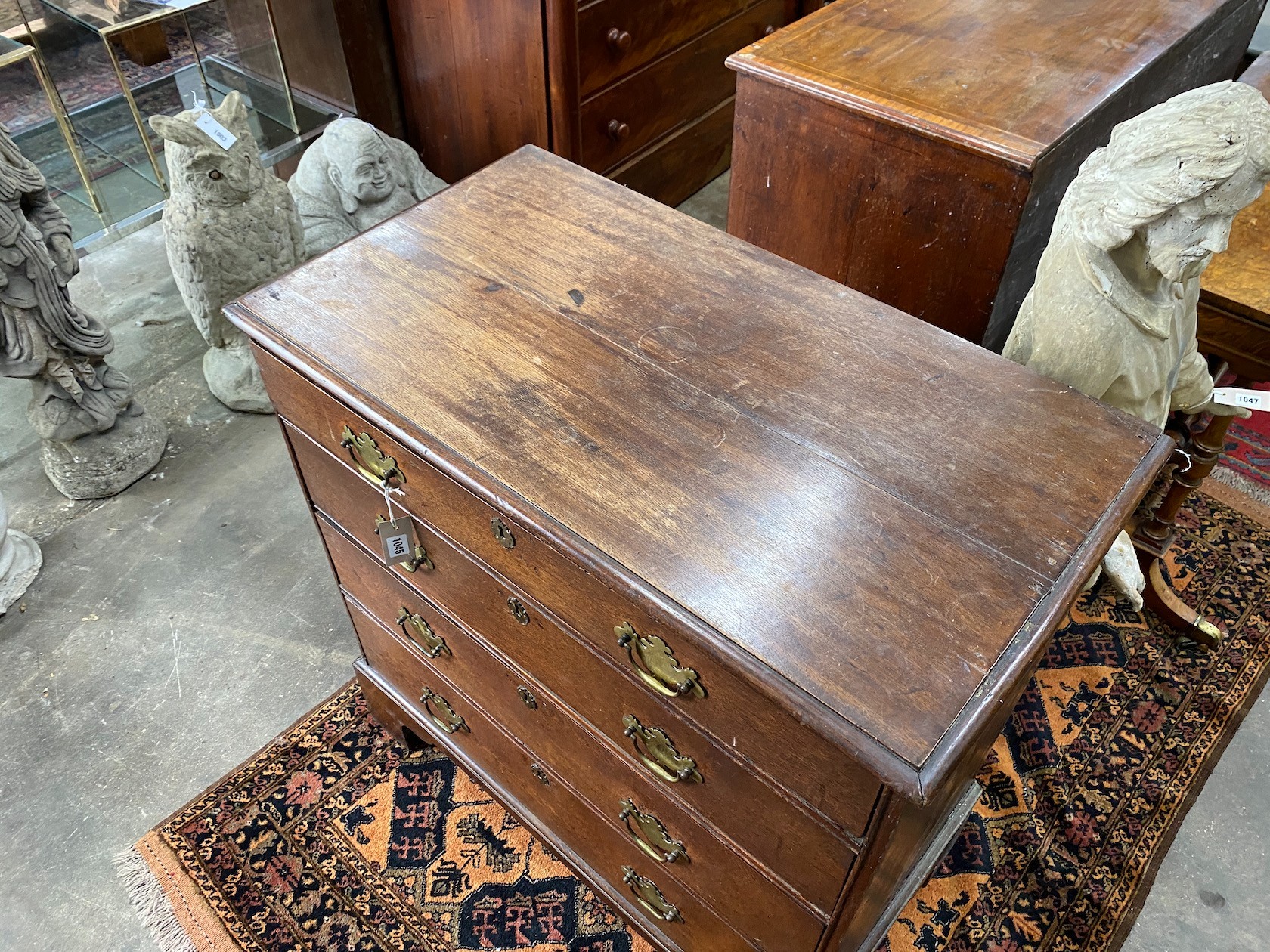 A George III oak chest of four drawers, width 89cm, depth 48cm, height 92cm